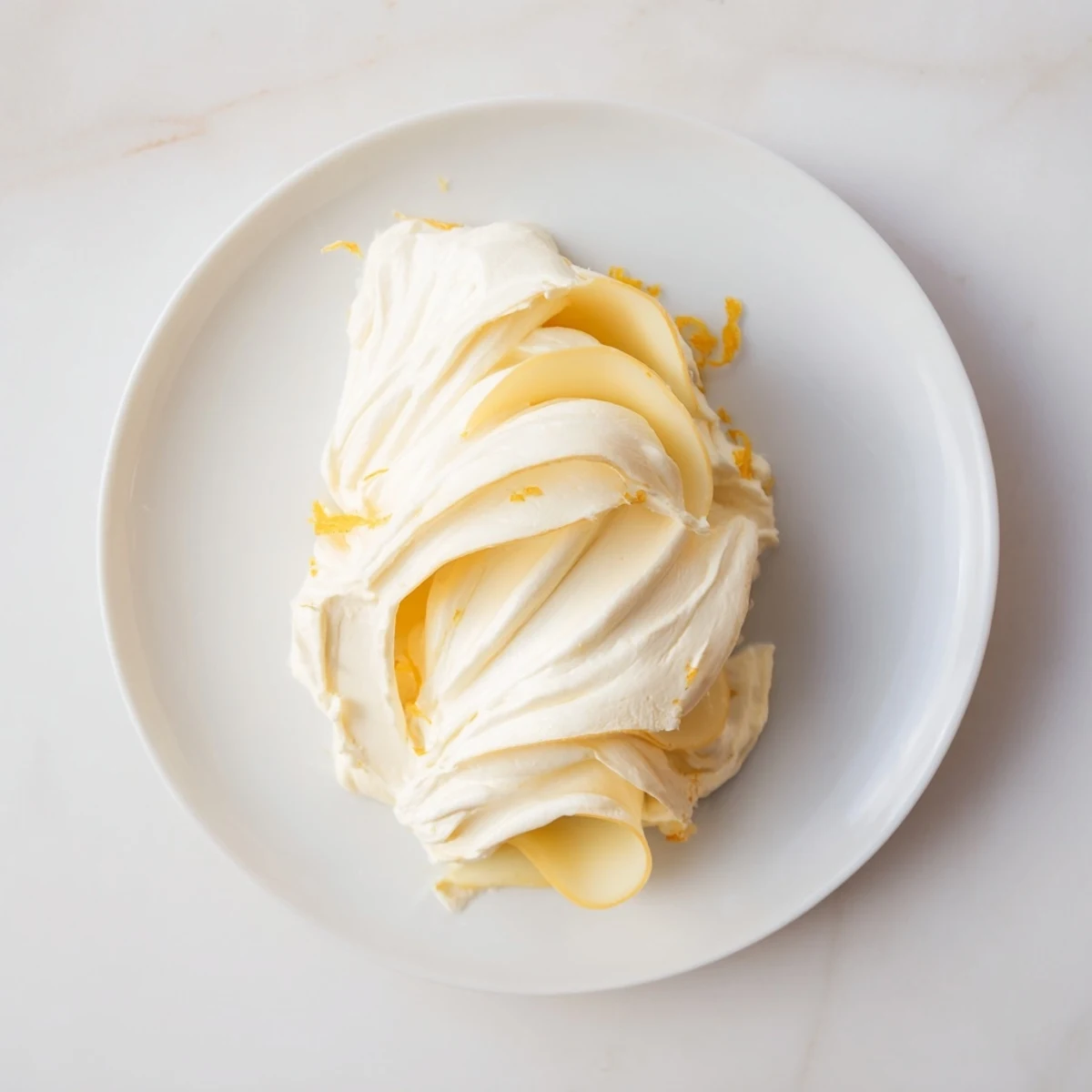 The Saffron Silk cheese board: a luxurious spread of yellow cheeses and creamy swirls, elegant and ready to serve.