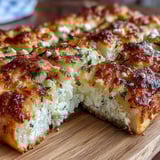 Warm, golden Fluffy Cottage Cheese Flatbread stacked high, ready for wraps or dipping.