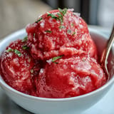 Vibrant, three-ingredient watermelon sorbet captured after chilling, perfect for dessert.
