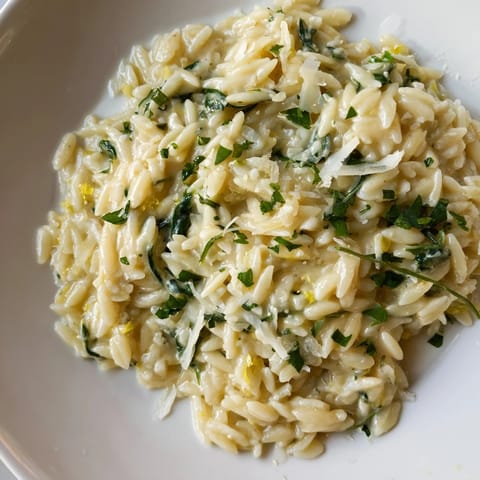 A single-pot of creamy, cheesy One-Pot Creamy Orzo, ready to be served hot and delicious.
