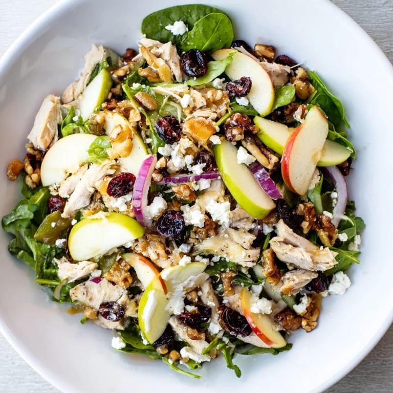 Enjoy a refreshing Chicken and Apple Winter Salad with a beautiful mix of textures and flavors.